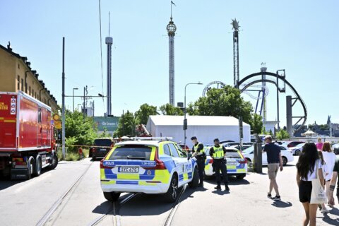 Riders plunge from a derailed roller coaster in Sweden, killing one and injuring several others