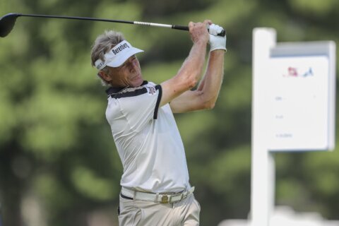 65-year-old Bernhard Langer takes a 2-shot lead in the US Senior Open at SentryWorld