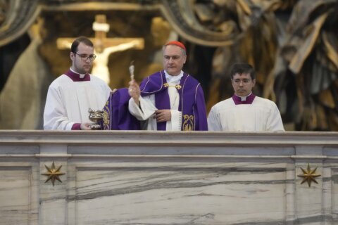 Cardinal performs rite to restore Vatican altar desecrated by man's naked protest
