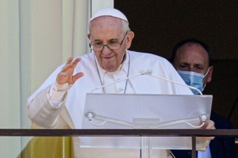 Vatican: Pope sitting up, working from an armchair after abdominal