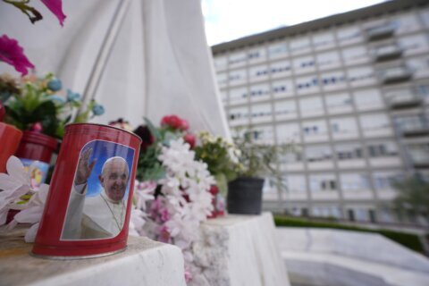 Hospitalized Pope Francis walks a bit, follows Mass on TV, lunches with medical personnel and aides