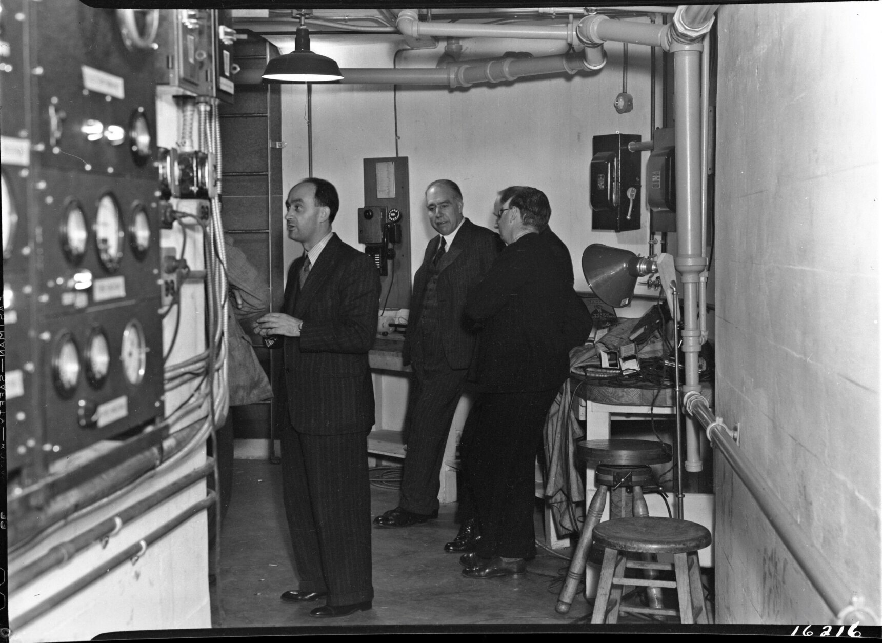 Fermi, Bohr, and Rosenfeld in the basement of the Atomic Physics Observatory, January 28, 1939. (Courtesy of the Carnegie Institute of Science)