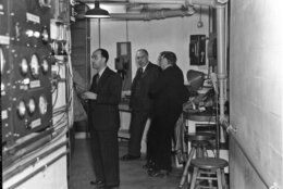 Fermi, Bohr, and Rosenfeld in the basement of the Atomic Physics Observatory, January 28, 1939. (Courtesy of the Carnegie Institute of Science)