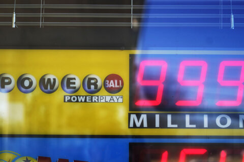Powerball fever sweeps DC area as the jackpot grows to $875 million
