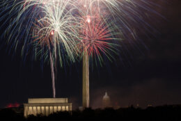 Fireworks burst on the National Mall above the Lincoln Memorial, Washington Monument and the U.S. Capitol building during Independence Day celebrations in Washington, late Tuesday, July 4, 2023. (AP Photo/Stephanie Scarbrough)