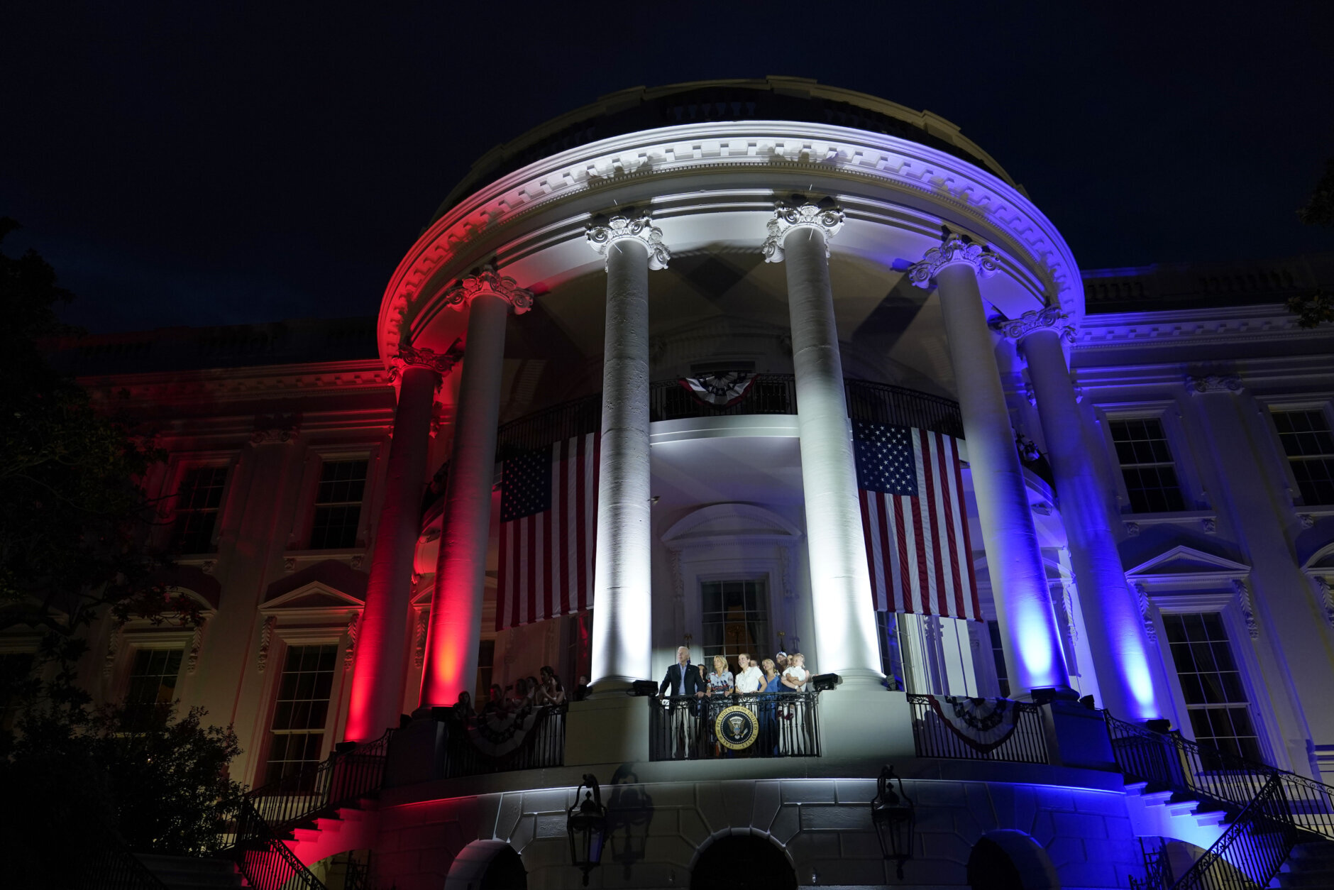 President Joe Biden and first lady Jill Biden and their family watch a fireworks show during a Fourth of July celebration at the White House in Washington, Tuesday, July 4, 2023. (AP Photo/Susan Walsh)