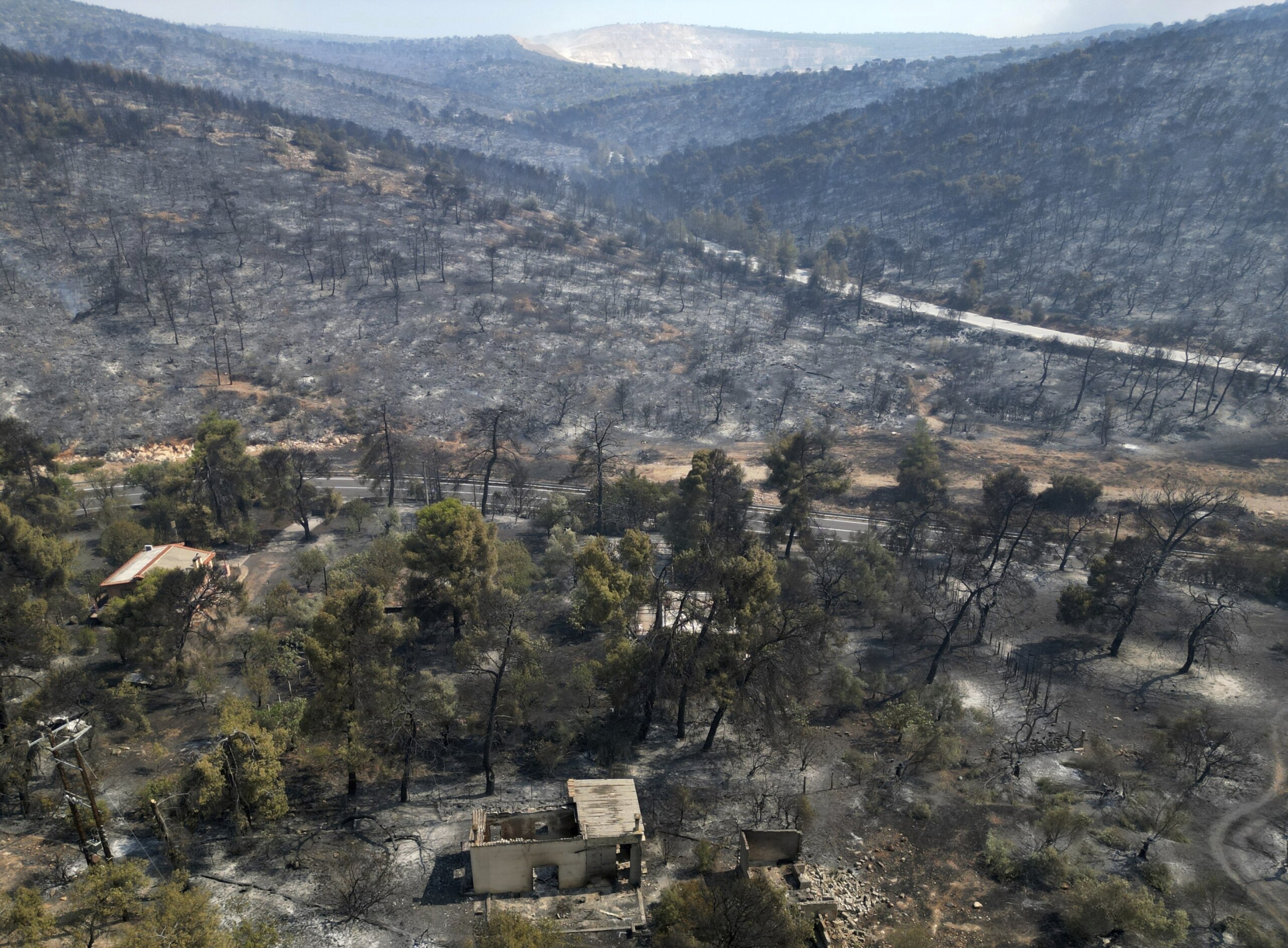 Fire crews lose control of blaze near Athens as southern Europe heat