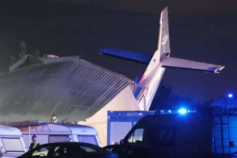 Plane hits hangar where people were sheltering in storm in Poland. Pilot and 4 others die and 8 hurt