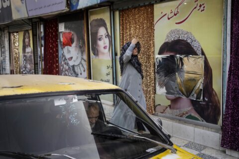 Taliban use stun guns, fire hoses and gunfire to break up Afghan women protesting beauty salon ban