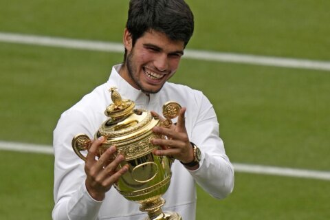 Carlos Alcaraz’s Wimbledon trophy keeps him at No. 1. Marketa Vondrousova’s lifts her to No. 10