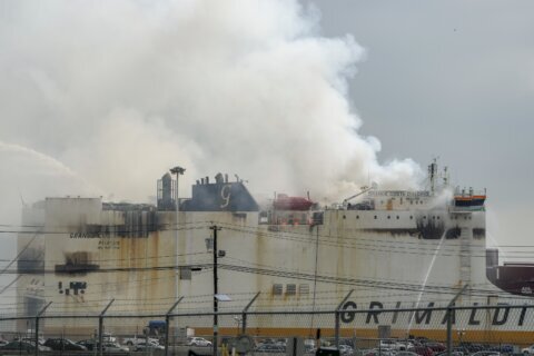 Fire that killed 2 on a cargo ship in New Jersey is out after nearly a week, officials say