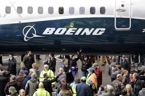 Boeing lost $149 million last quarter as the plane maker pushes ahead with production increases