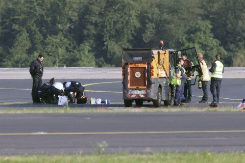 Climate activists block runways at 2 German airports, disrupting flights for hours