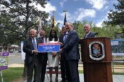 Maryland officials celebrate a $25 million dollar federal grant that will create more transportation options and improvements from Capitol Heights to Largo Town Center. (WTOP/Kate Ryan)