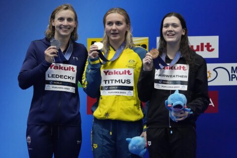Australian Titmus takes it out fast and sets WR in 400m freestyle as Ledecky settles for silver