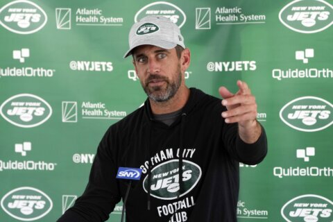 Aaron Rodgers takes a pay cut and agrees to a 2-year, $75 million deal with the Jets, AP source says