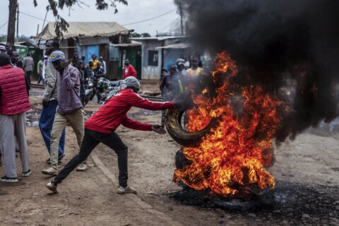 Police say officers kill at least 6 as Kenyans protest rising costs, and 50 children are tear-gassed