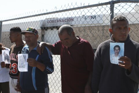 Survivors of Mexico's worst migrant detention center fire stuck in limbo, unable to support families