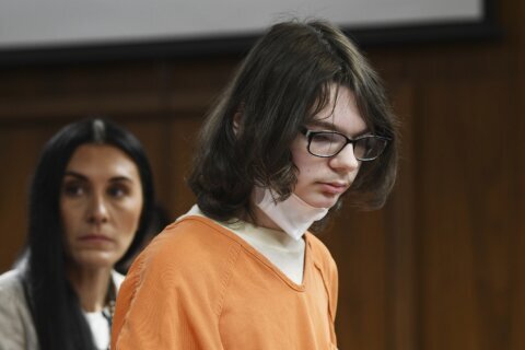 A staffer recalls chaos and wound at key sentencing hearing for a Michigan school shooter