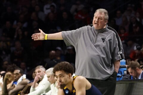 Bob Huggins says he plans to stay in rehab and wants to return to West Virginia as coach