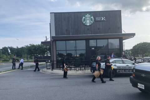 Armored truck employee shoots, kills man at Md. Starbucks, police say