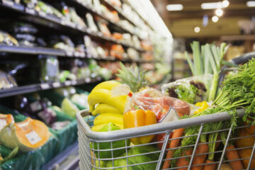 A cart full of veggies in a grocery store is seen in this stock photo. (Courtesy Getty Images/Dan Dalton)
