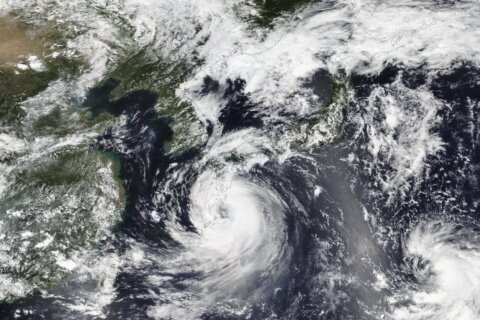 Khanun begins blowing into South Korea with strong winds after dumping rain on Japan for a week
