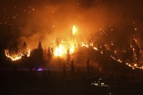 Canadian firefighters wage epic battle to save communities after mass evacuations
