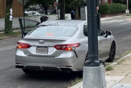 Photos from a DC man who was walking a dog when he witnessed a carjacking show the crime in progress. 