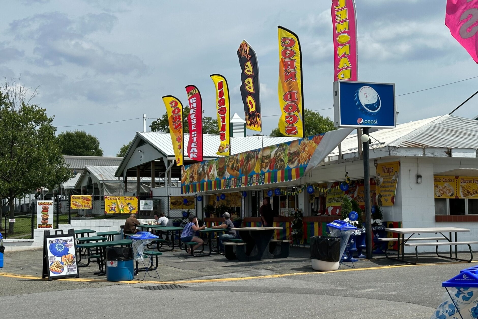 A row of food vendors at the Montgomery County Agricultural Fair (WTOP/Matt Kaufax)