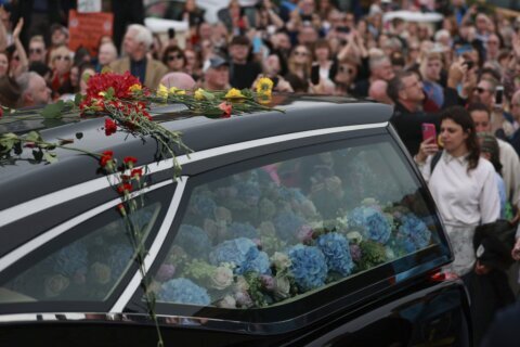 Mourners in Ireland pay their respects to singer Sinéad O’Connor at funeral procession