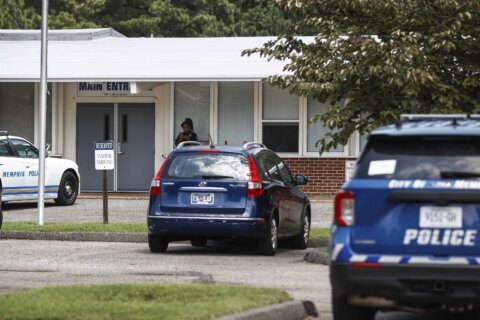 Armed man who tried to enter a Jewish school in Tennessee fired at a contractor, police say