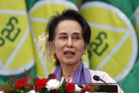 Aung San Suu Kyi has some of her prison sentences reduced by Myanmar's military-led government