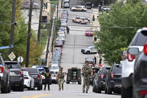 Gunfire in Pittsburgh neighborhood prompts standoff and evacuations; 1 person later pronounced dead