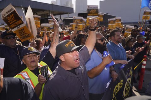 UPS workers approve 5-year contract, capping contentious negotiations that threatened deliveries