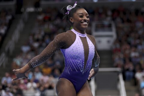 Simone Biles makes history on opening day of qualifying at World Artistic Gymnastics Championships