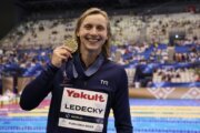 Katie Ledecky recently surpassed Michael Phelps' record of world swimming titles.