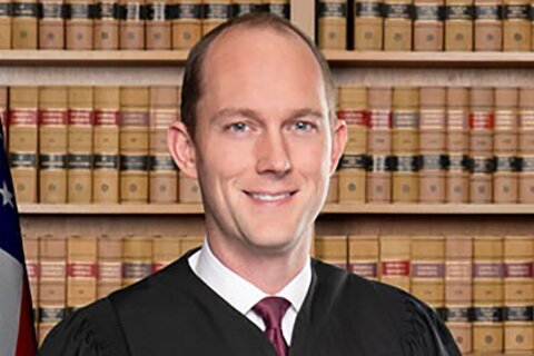 Who is Scott McAfee, the judge assigned to oversee Trump case in Georgia?