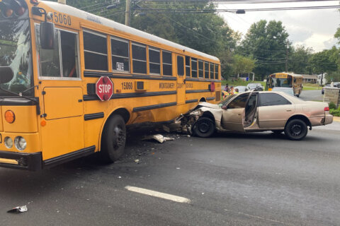 Crash involving school bus sends 3 adults to hospital in Montgomery Co.