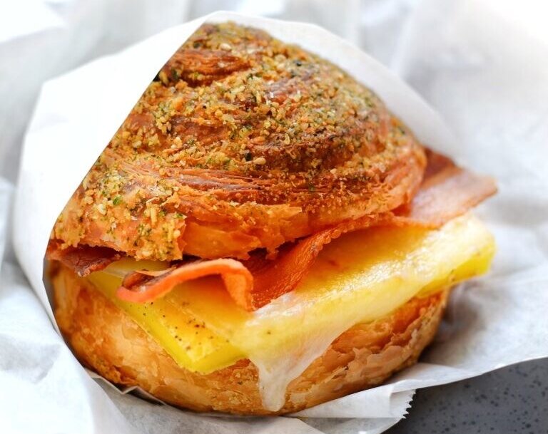 Bacon egg cheese sandwich scallion roll rose ave bakery