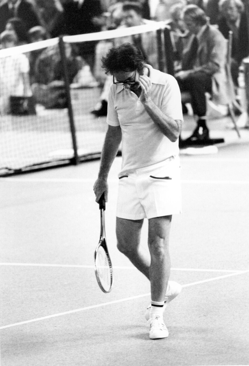 FILE - In this Sept. 20, 1973, file photo, Bobby Riggs walks off the court near the end of the third match against Billie Jean King in their $100,000 winner-take-all tennis match at the Houston Astrodome, Texas. King won 6-4, 6-3, 6-3. (AP Photo/File)