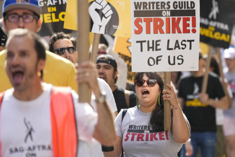 Writers Guild and Hollywood studios reach tentative deal to end strike. No deal yet for actors