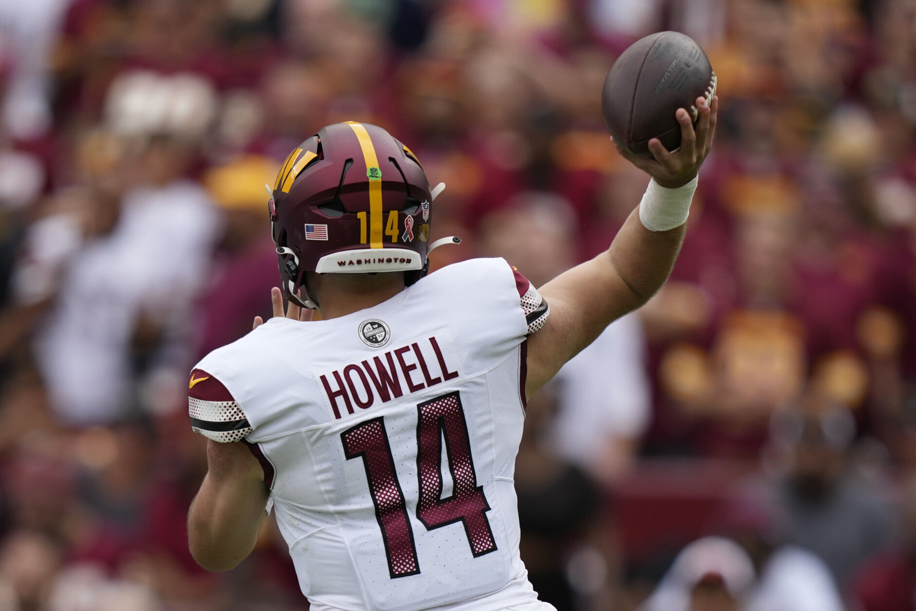 Washington Commanders quarterback Sam Howell (14) throws the ball during the first half of an NFL preseason football game against the Arizona Cardinals, Sunday, Sept. 10, 2023, in Landover, Md. (AP Photo/Alex Brandon)