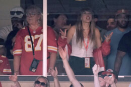 Taylor Swift, right, watches from a suite alongside Travis Kelce's mother, Donna Kelce, inside Arrowhead Stadium during the first half of an NFL football game between the Chicago Bears and Kansas City Chiefs Sunday, Sept. 24, 2023, in Kansas City, Mo. (AP Photo/Charlie Riedel)