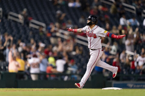 Braves reach 100 wins again, beat Nationals 8-5 behind Strider to secure doubleheader split