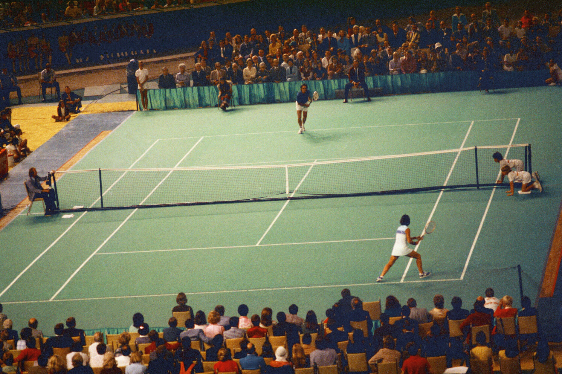 Tennis star Bobby Riggs, top, and Billie Jean King are shown in action during the "Battle of the Sexes" match in the Astrodome in Houston, Tex., Sept. 20, 1973.  (AP Photo))