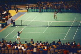 Tennis star Bobby Riggs, bottom, and Billie Jean King are shown in action during the "Battle of the Sexes" match in the Astrodome in Houston, Tex., Sept. 20, 1973.  (AP Photo)