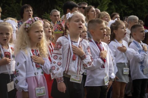 It’s joy mixed with sorrow as Ukrainian children go back to school in the midst of war