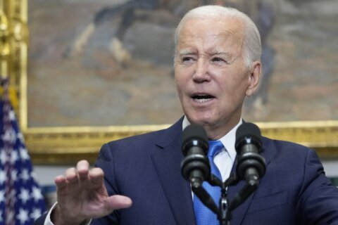 Biden aims to beef up safeguards for government workers as GOP hopefuls vow to slash workforce