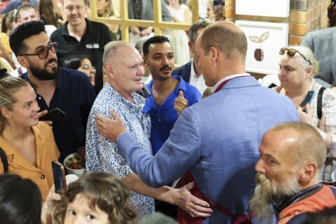 What happened when England's soccer great Gascoigne met Prince William in a shop? A cheeky kiss